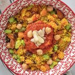 Couscous with vegetable ragu, almonds and chickpeas